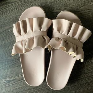 Pink ruffled slides